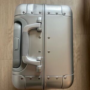 Metallic Silver Travel Suitcase